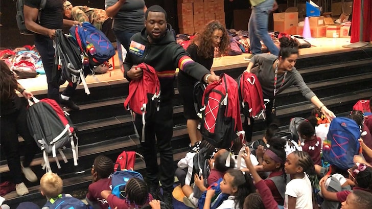 Meek Mill gives away backpacks, supplies at his old school